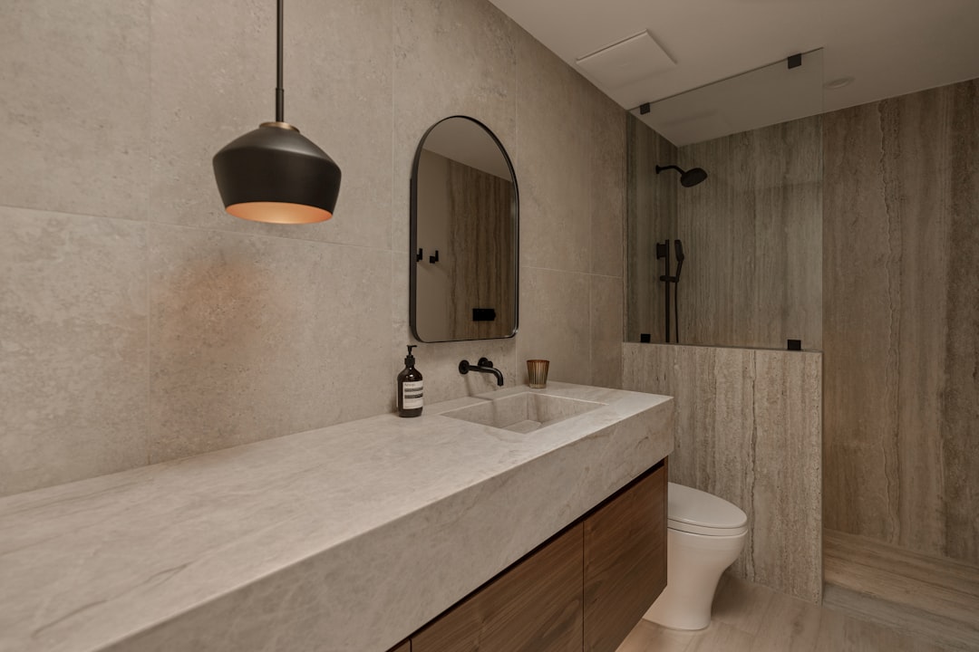 Commercial Stone Shower & Wet Room Surfaces: Sourcing Guide